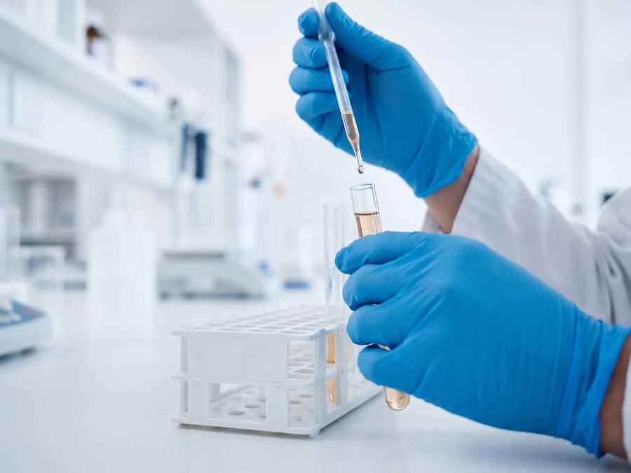 Lab technician testing a sample